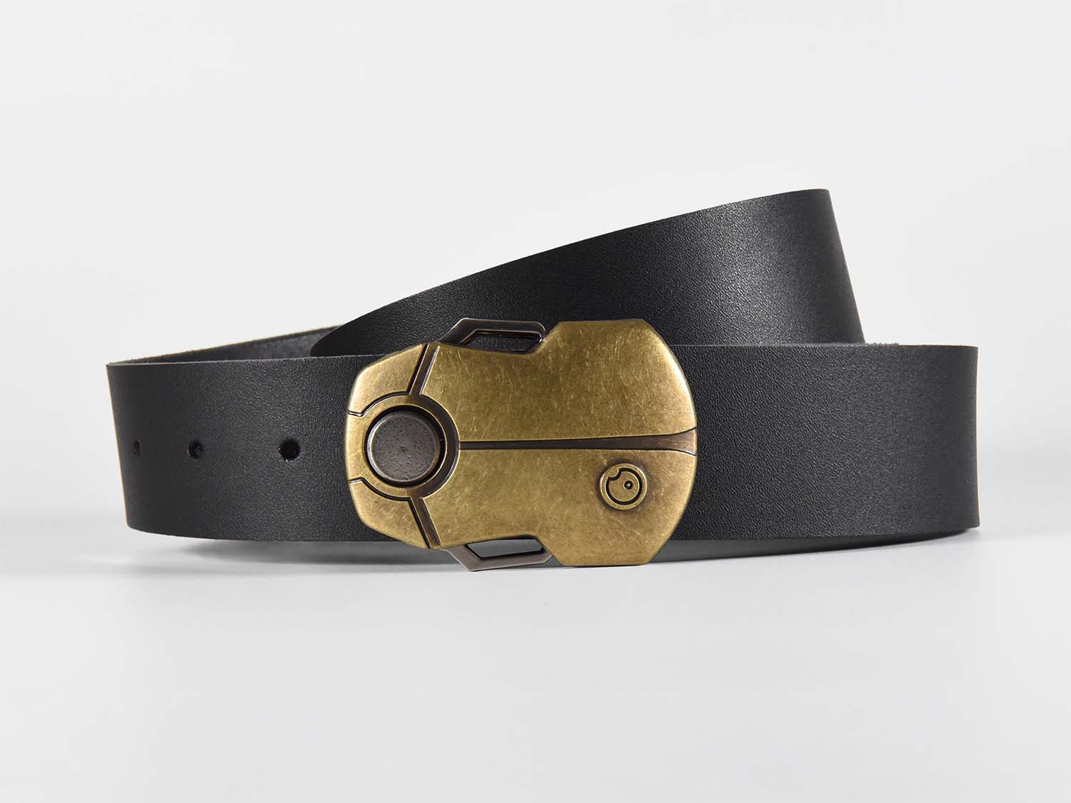 Black leather belt with a gold buckle shaped like a Scarab Beetle on a white background