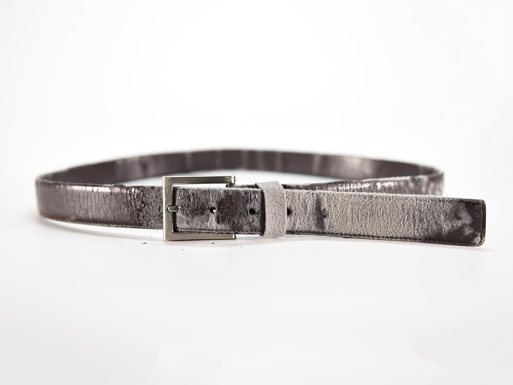 discount leather belt that looks worn. wearing genuine leather belts is a risk. Looks great the first day, but quickly breaks down after you've worn it a few times. geniune leather is bad.