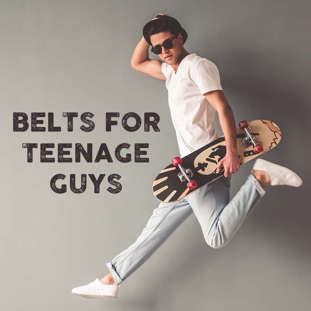 cool belts for young guys. Stylish young man leaping in the air while holding a skateboard and hat.