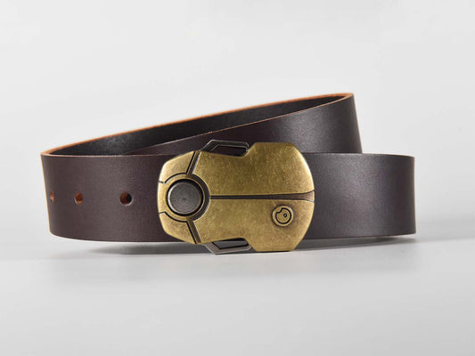 Dark brown leather belt with a brass buckle shaped like a Scarab Beetle on a white background