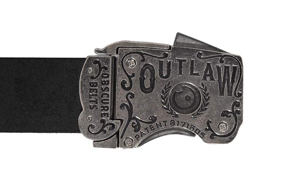 The back of the Outlaw gun belt buckle has a western-inspired design with filigree, the words Outlaw, Obscure Belts, and US Patent 8171605