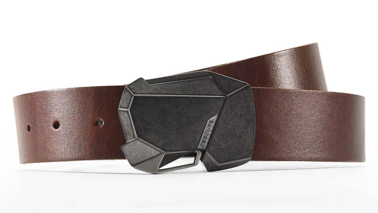Fractal 2.0 in futuristic antique stone and off-white finish on brown full-grain leather belt. Push the quick release button to unlock. Adjustable belt with custom sizes available.