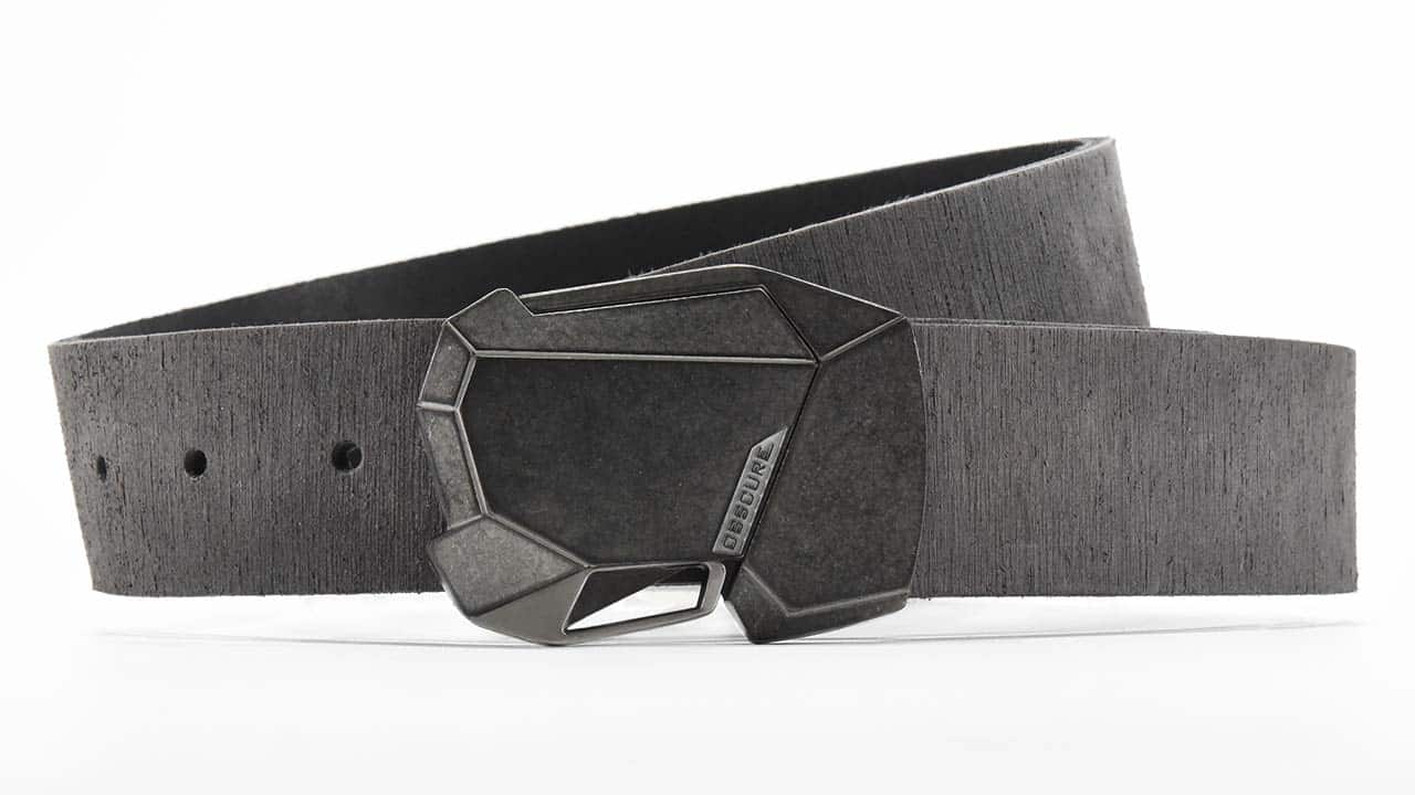 Fractal 2.0 in futuristic antique stone and off-white finish on gray rough rider distressed leather belt. Push the quick release button to unlock. Adjustable belt with custom sizes available.