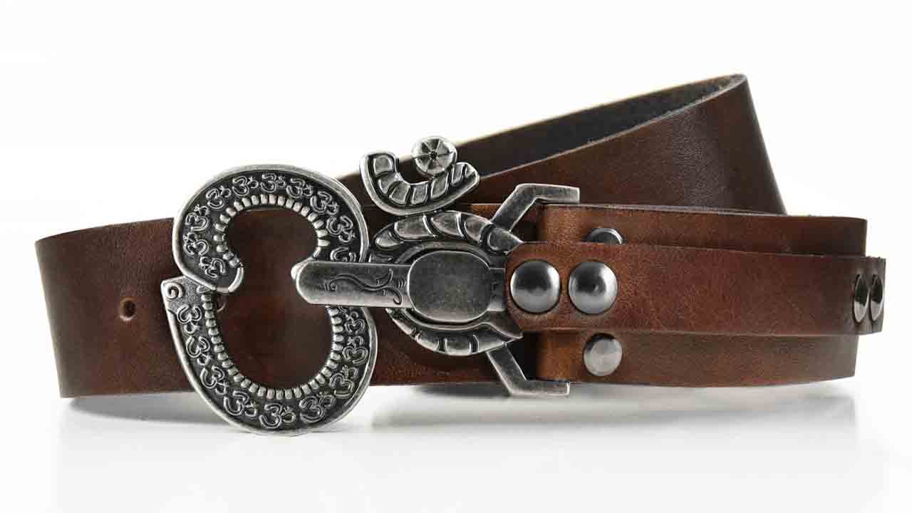 Aged Ohm peace symbol belt buckle. Pull pin to unlock. Brown full grain American leather belt. Womens belt for dress or jeans.