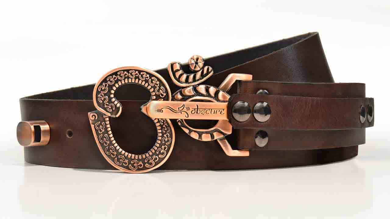 Ohm copper belt buckle peace symbol. Brown full grain American leather belt. Made to last a lifetime. Pull the pin to unlock.